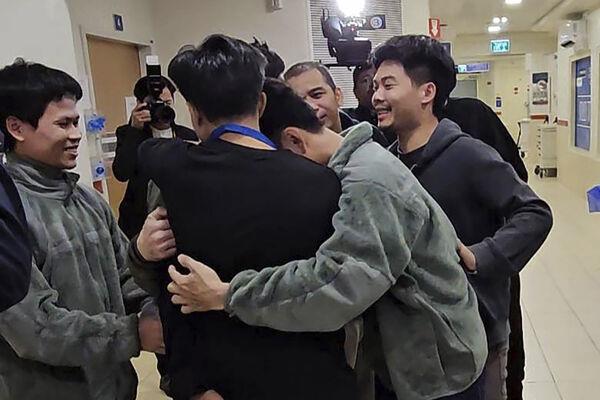 Thai hostages, who were previously released, hug their newly-freed compatriots at the Shamir Medical Center in Israel. Picture: Thailand's Foreign Ministry via AP&nbsp;